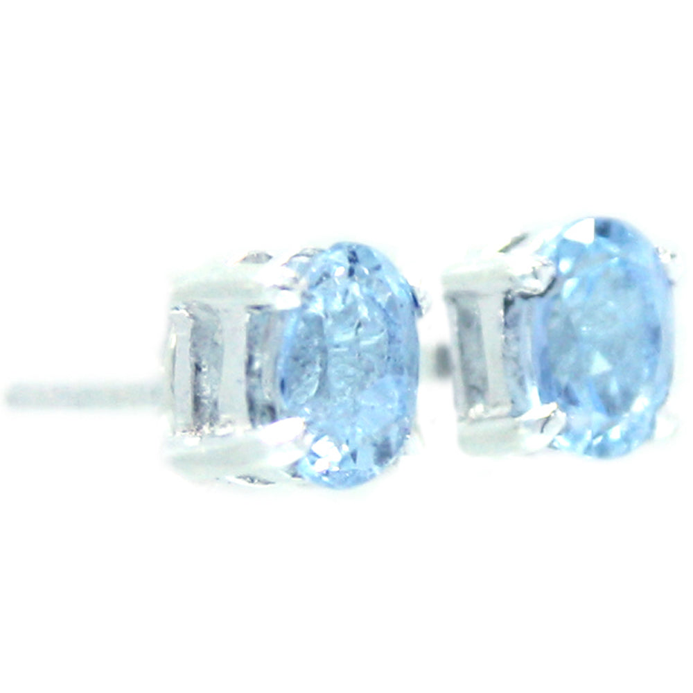 Clous d’oreilles topaze bleue en argent massif 925