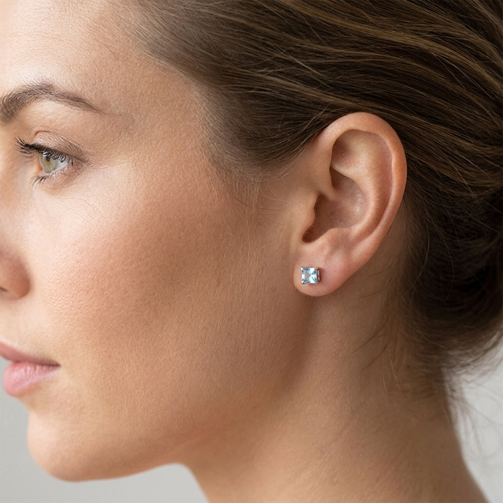 Blue topaz sterling silver ear studs